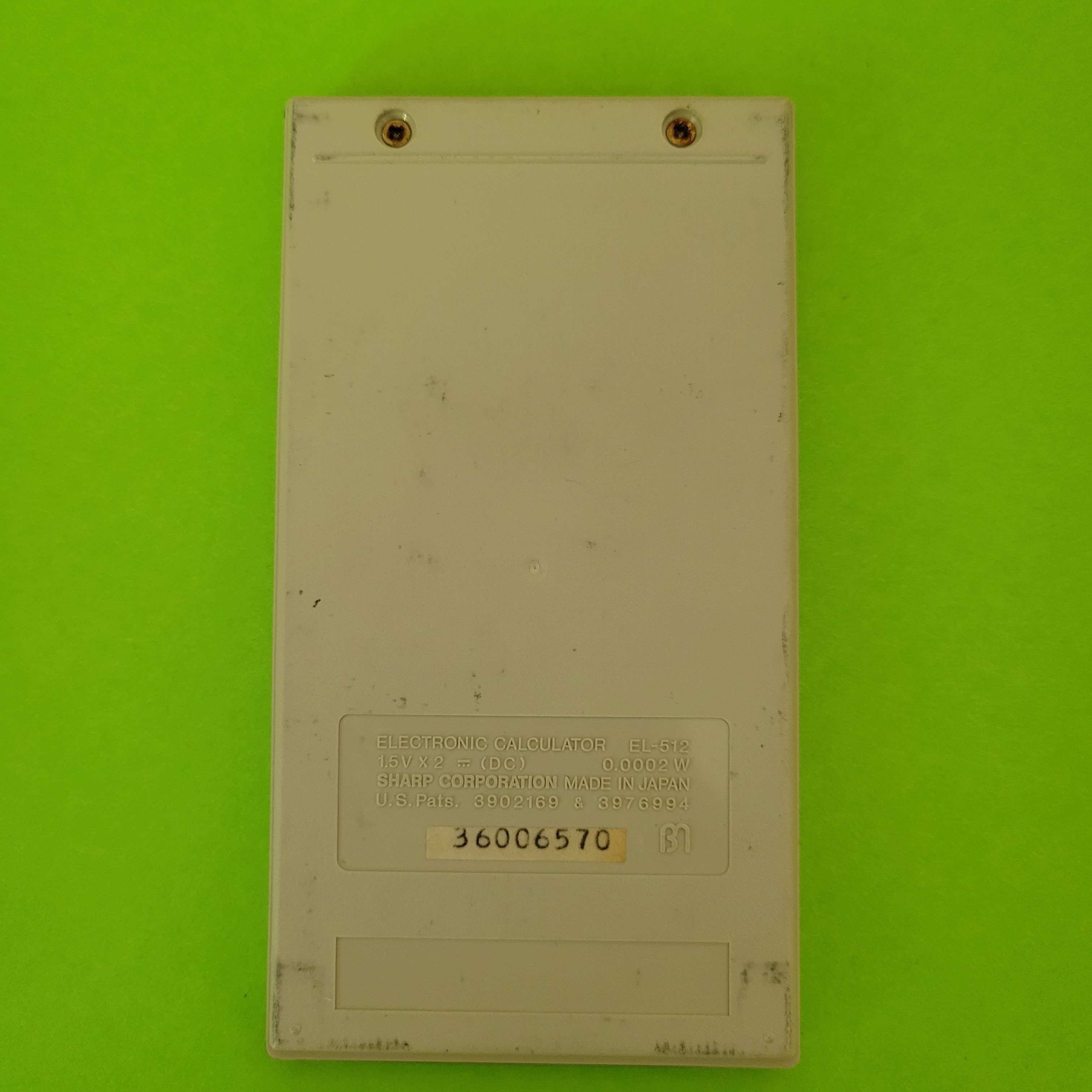 An image of the back of a Sharp EL-512 Scientific/Engineering calculator